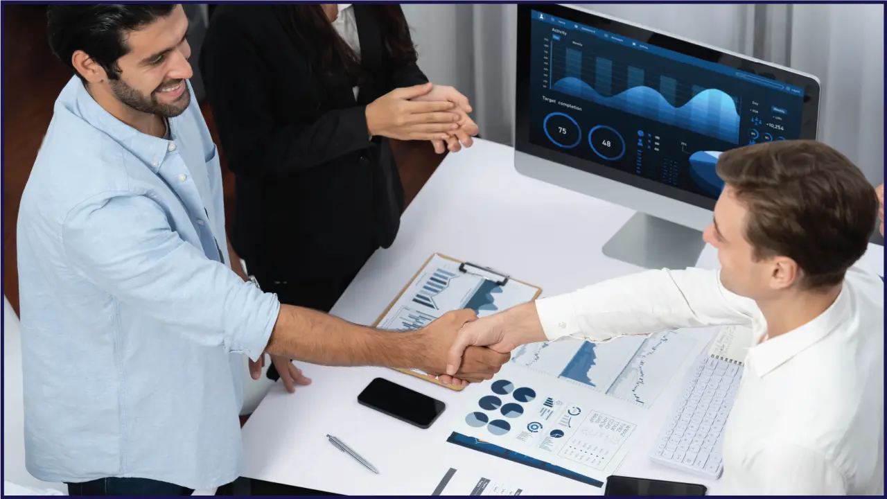 men shaking hands over a business deal - software company in Bahrain